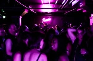 At the Naughty Ball, lively party atmosphere.